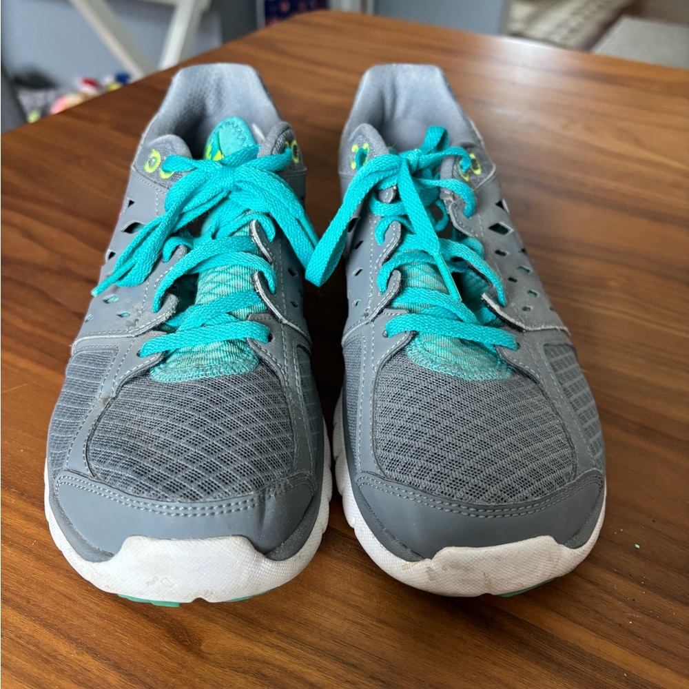 Nike Gray and Teal Flex Run Sneakers.